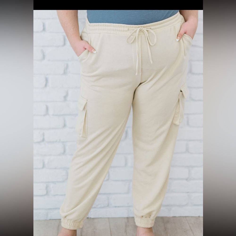 Cargo joggers in cream with drawstring elastic waist and ankles. New in bag.